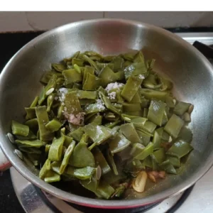 Adding cooked beans