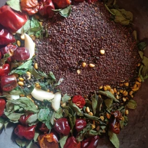 Adding sesame seeds to the idli podi mixture