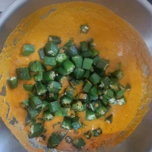 Add shallot tomato paste and sauteed ladies finger